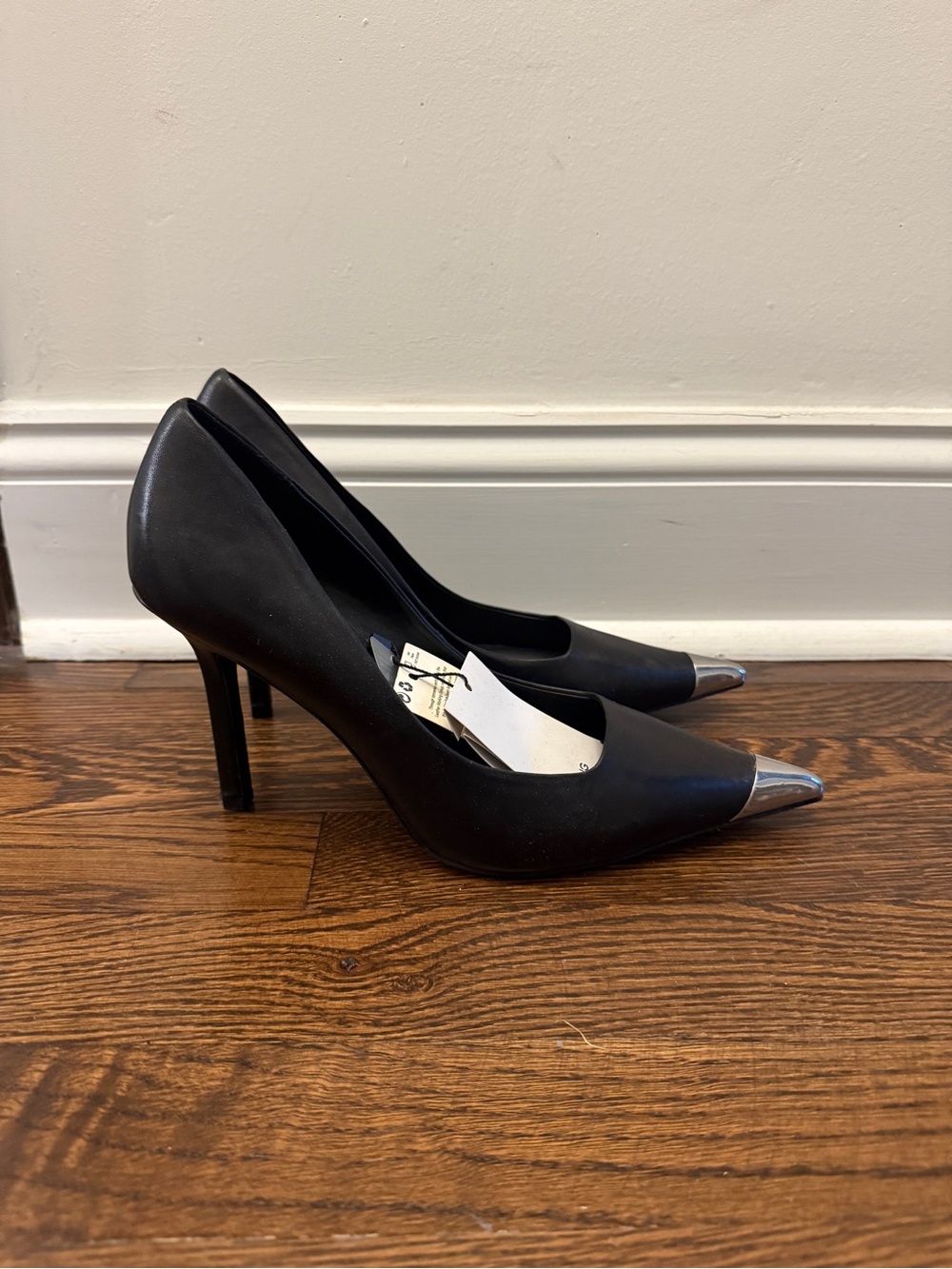 Black Pointed-Toe Stiletto Pumps with Silver Cap Toe